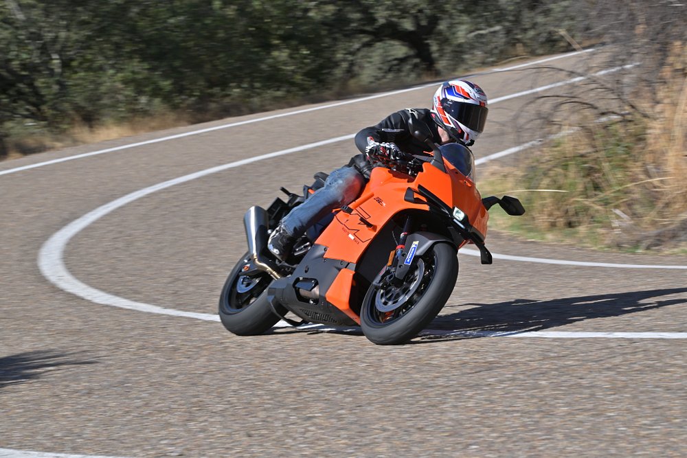 2026 KTM 990 RC R riding along a curvy road.