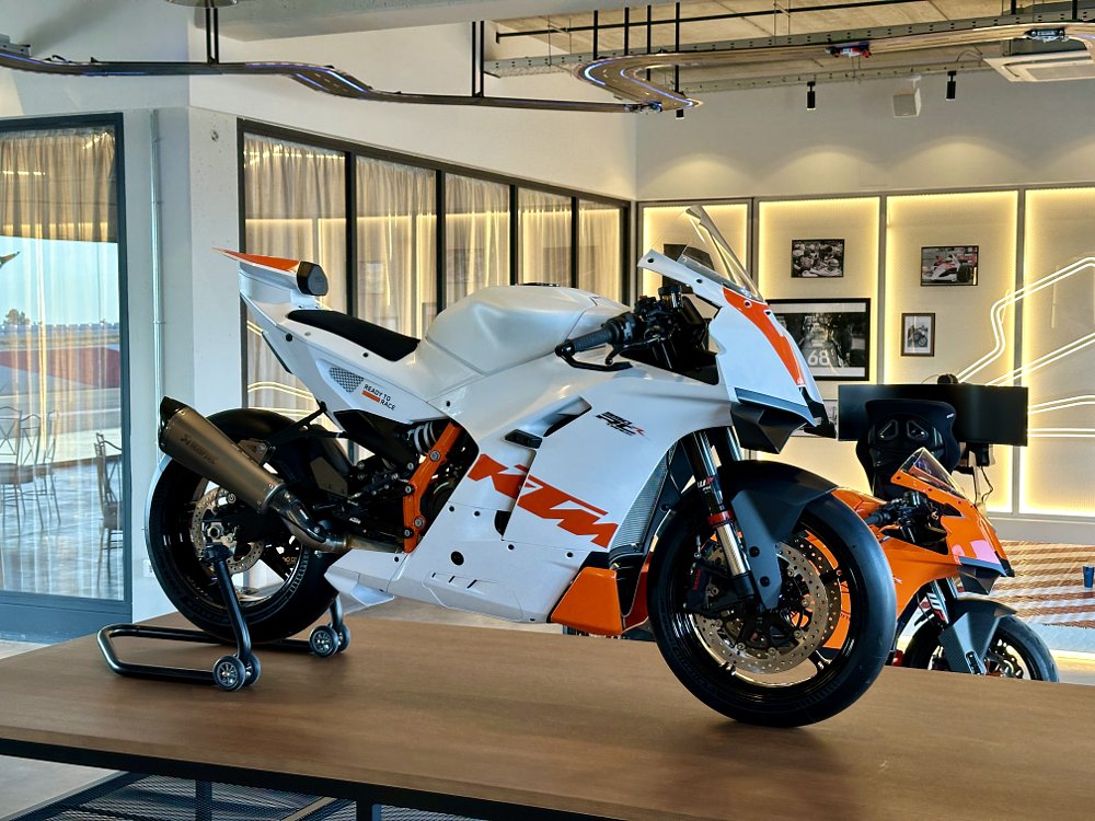 2026 KTM 990 RC R track-specific model, shown on a stand inside a garage.