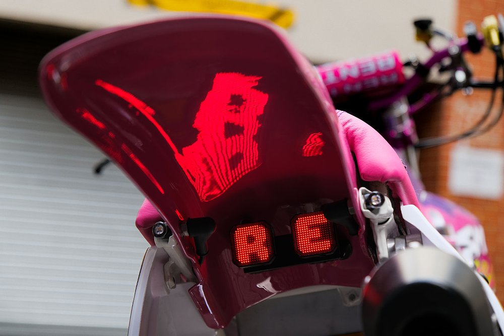 rear light showing letters 'R E' 