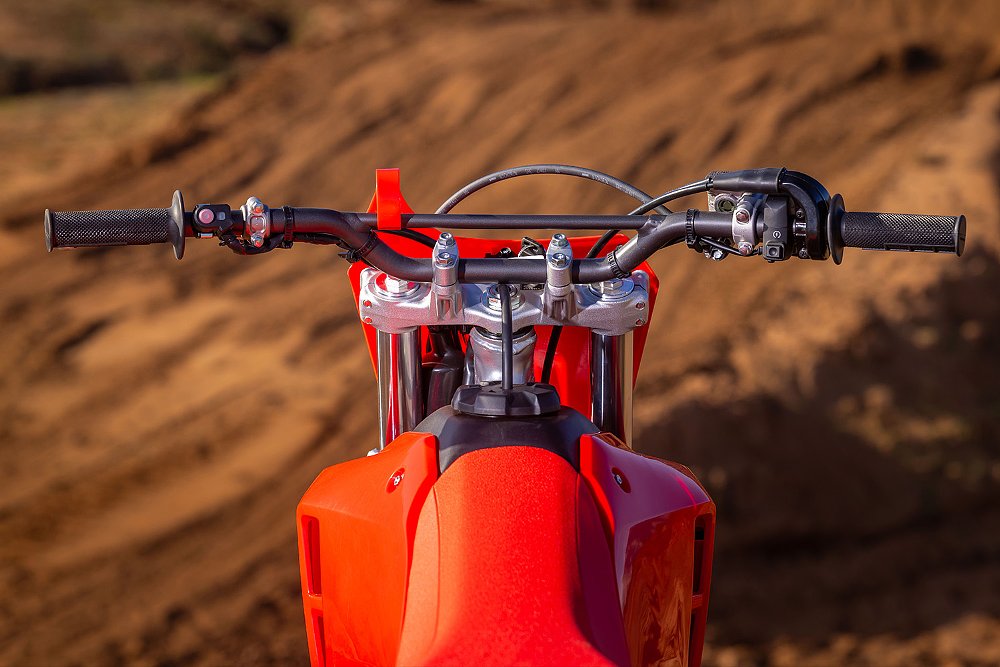 A view of the CRF300F's cockpit from the bike's rear.