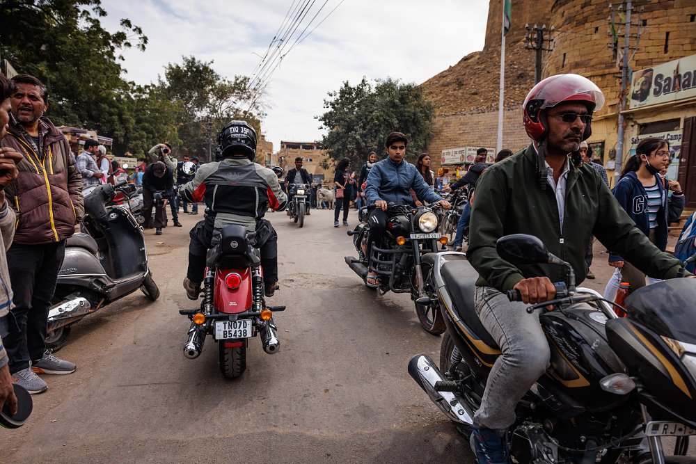 crowded street full of motorcycle traffic in India