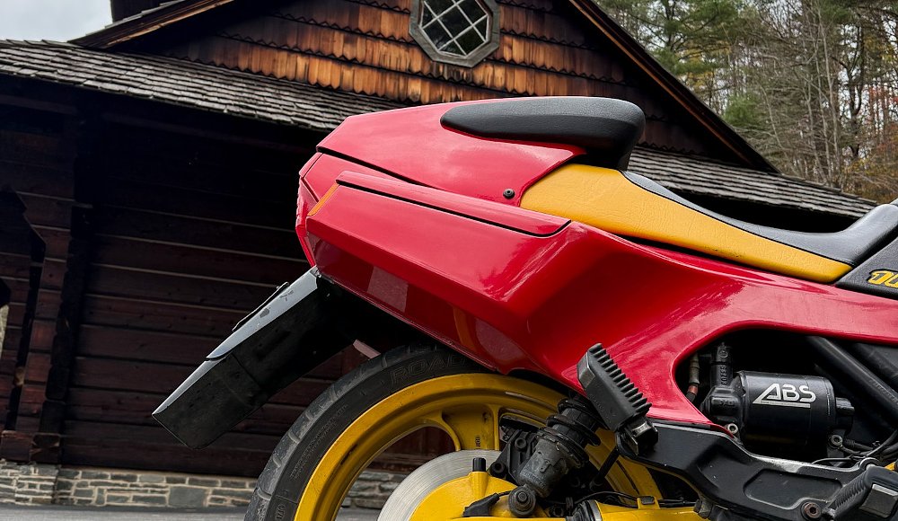 close view of the small, locking compartment on the K1's tail section