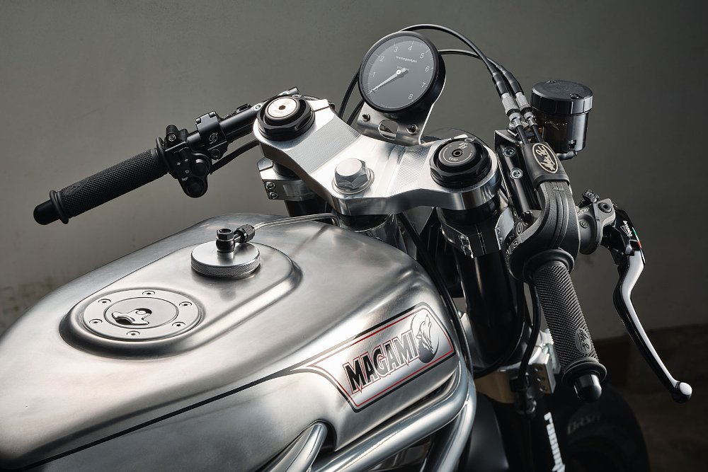 close view of unpainted aluminum fuel tank