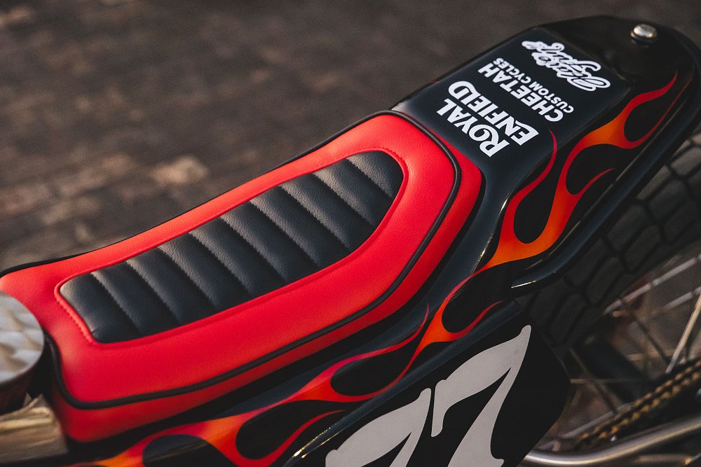 overhead view of the red and black stitched seat