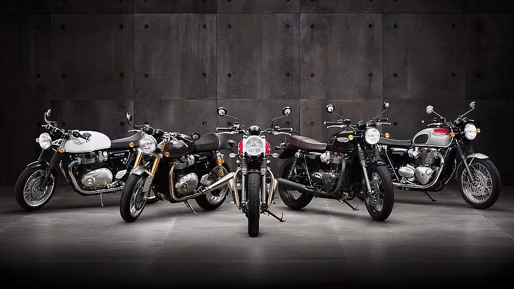 The 2016 Triumph Bonneville lineup captured in an industrial warehouse.
