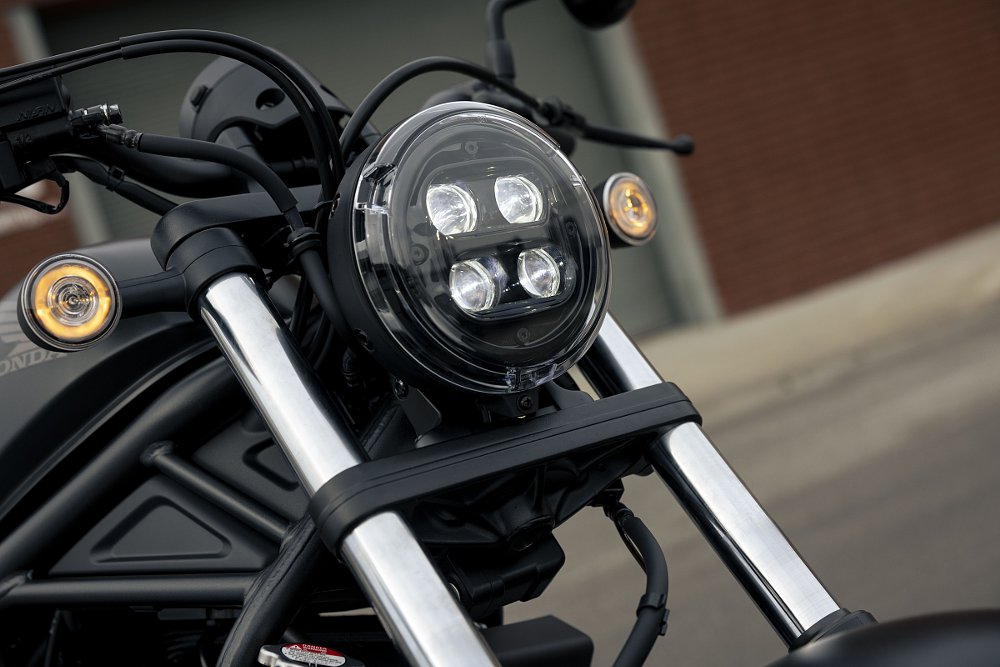 front view of round headlight housing with four LEDs inside