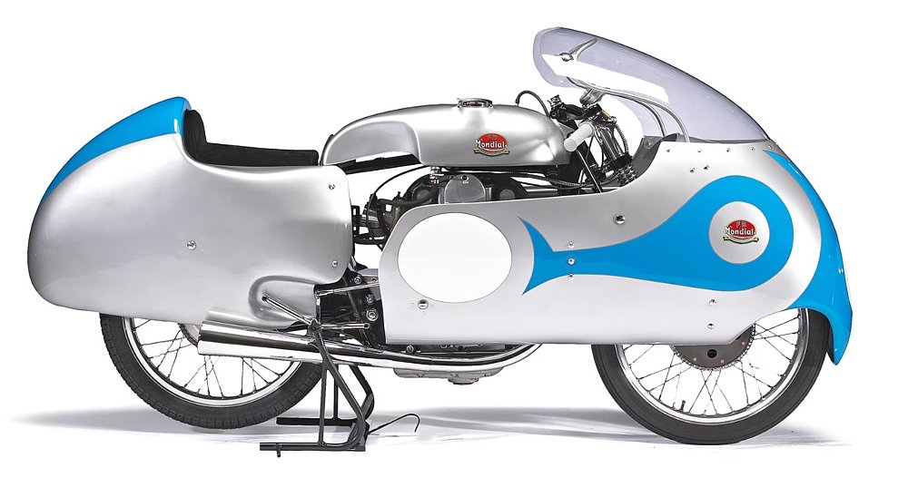 vintage silver and blue racing motorcycle with full-coverage 'dustbin' fairing