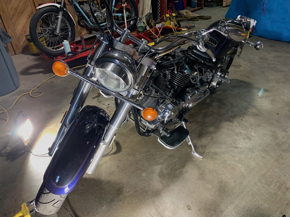 the blue V-Star in the full garage at J2J