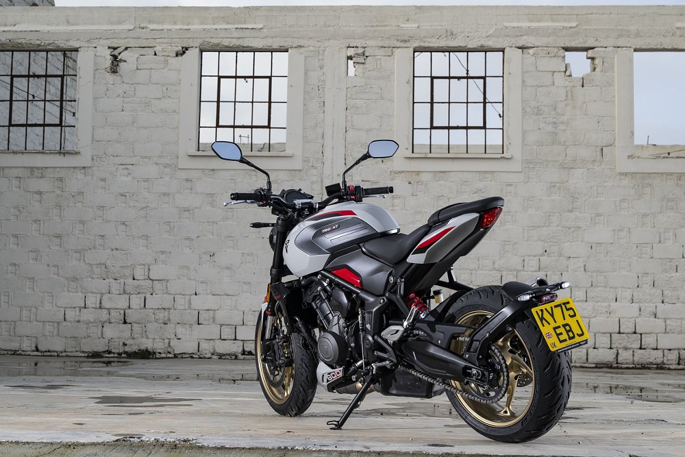 rear view of the parked Trident 800 showing swingarm-mounted bracket for the signals and plate