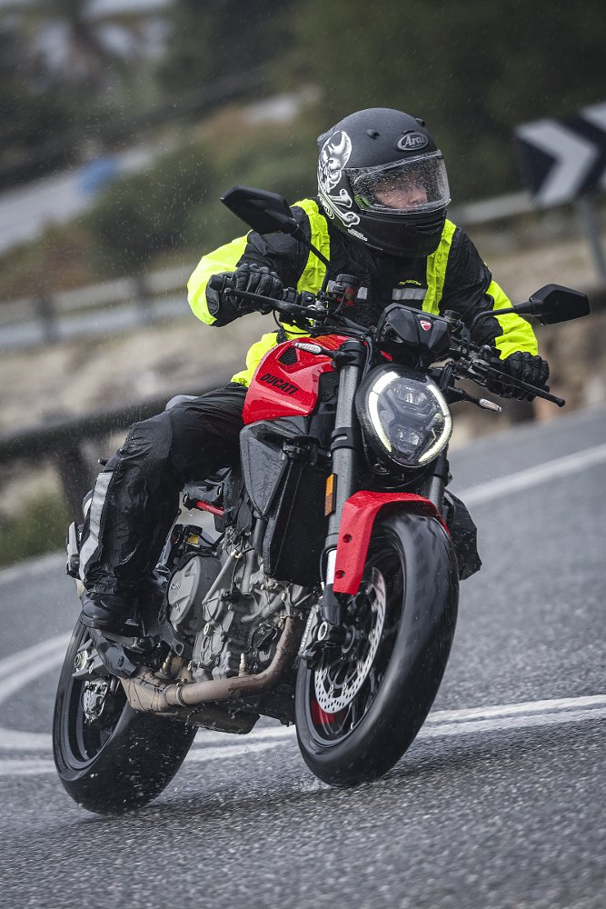 riding the Monster in the rain on a curvy road