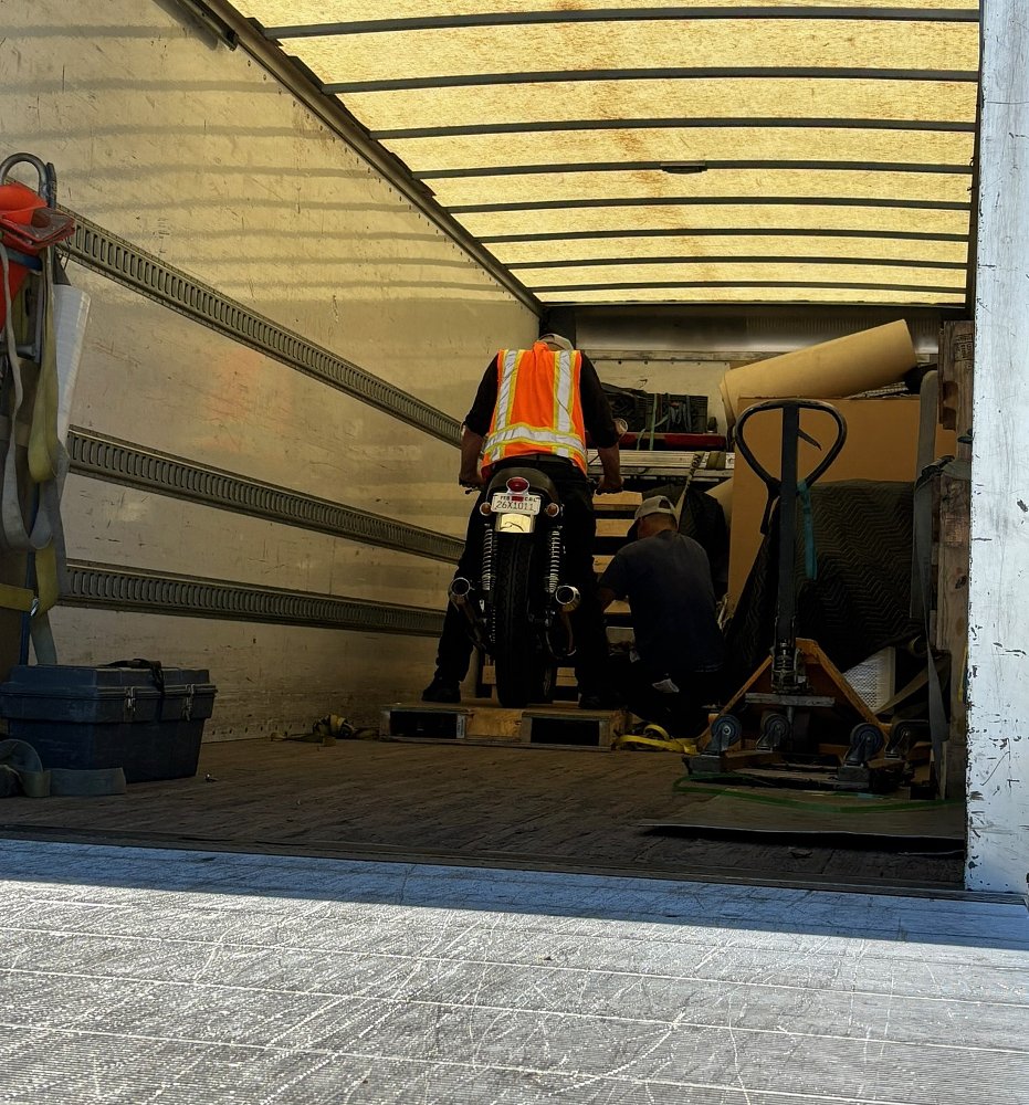 view from outside of the CB360 loaded into the back of a semi tractor-trailer