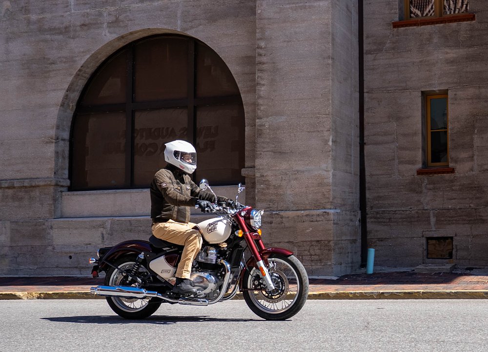 riding alongside a stone building in St. Augustine, Florida