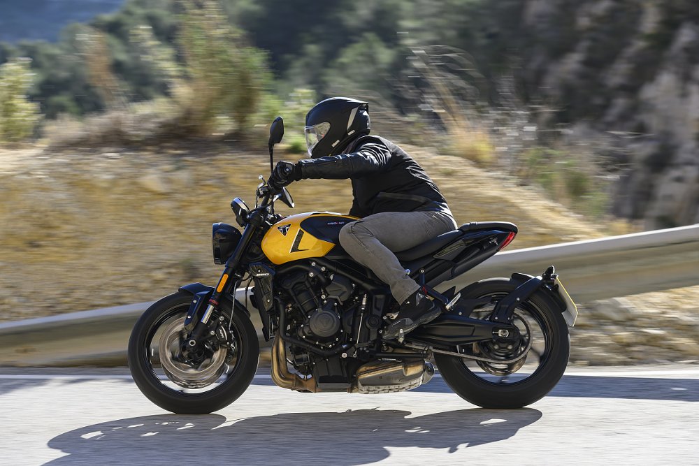 the rider leaned over in a curve on the Trident 660