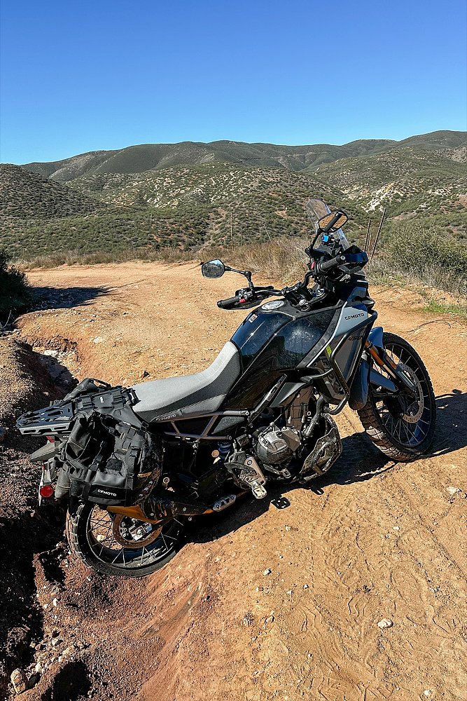 The Ibex 450 pictured with its rear wheel stuck in a rut.