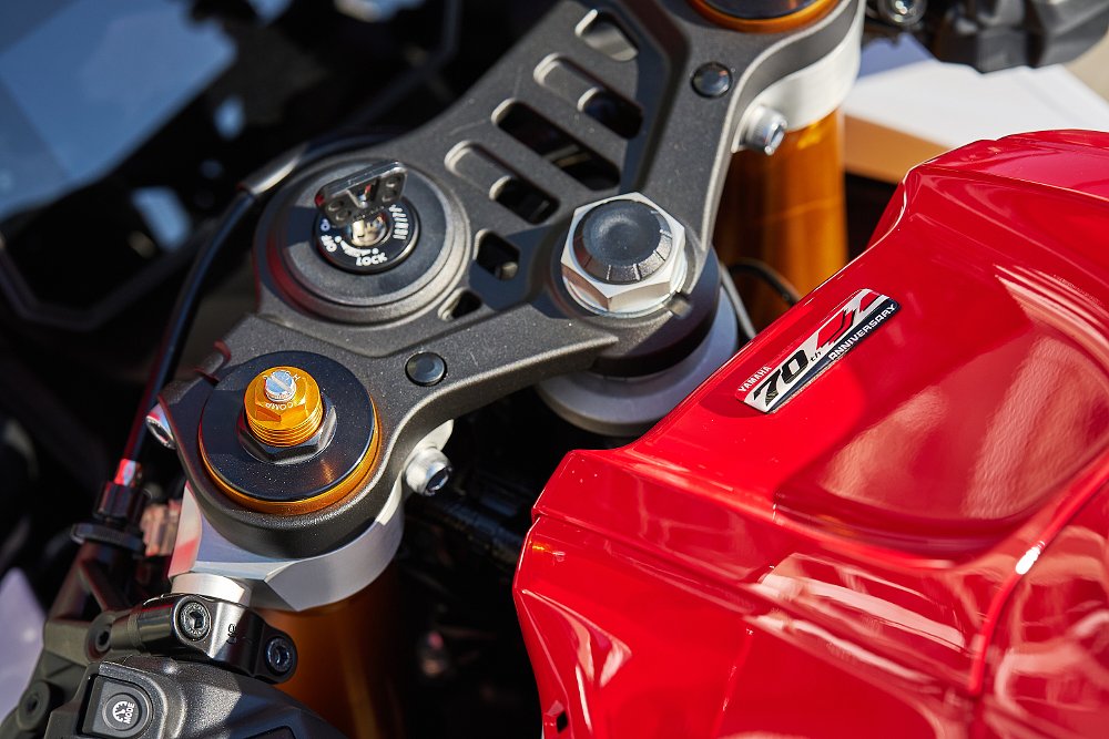 close view of the anniversary badge on the red tank