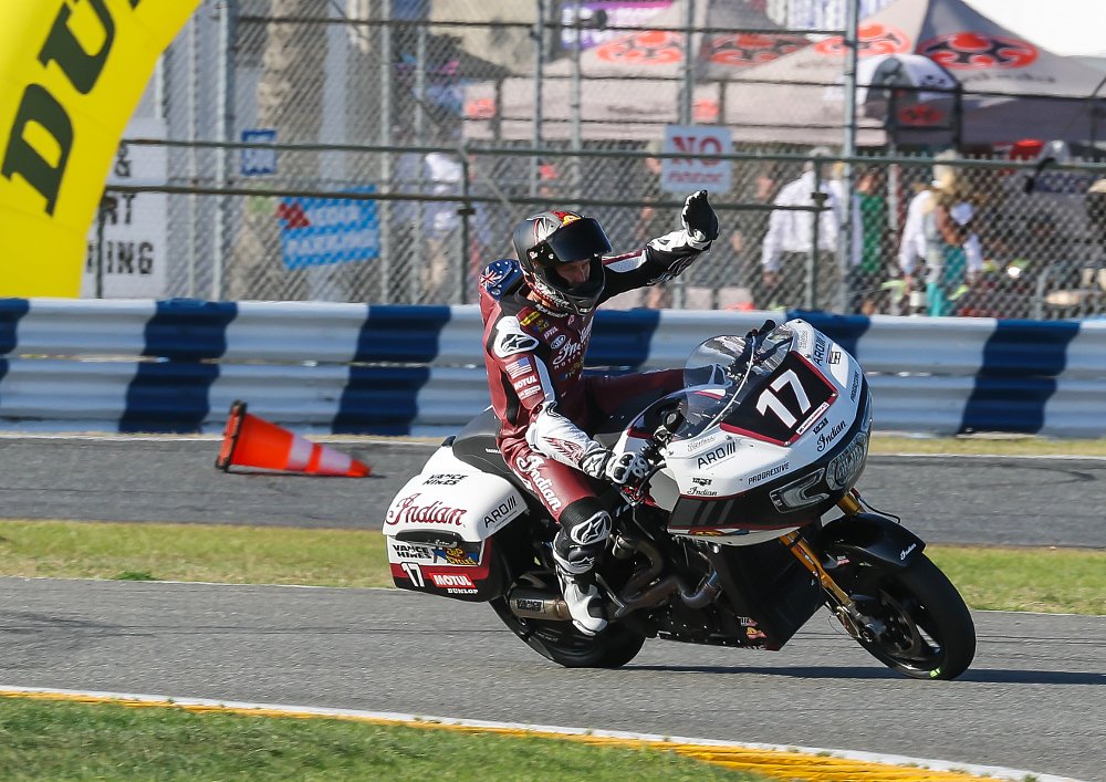 Herfoss on his Indian Challenger waving to fans on the victory lap