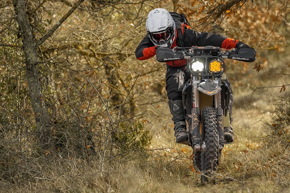 Killian Moreno riding his custom KTM on a trail