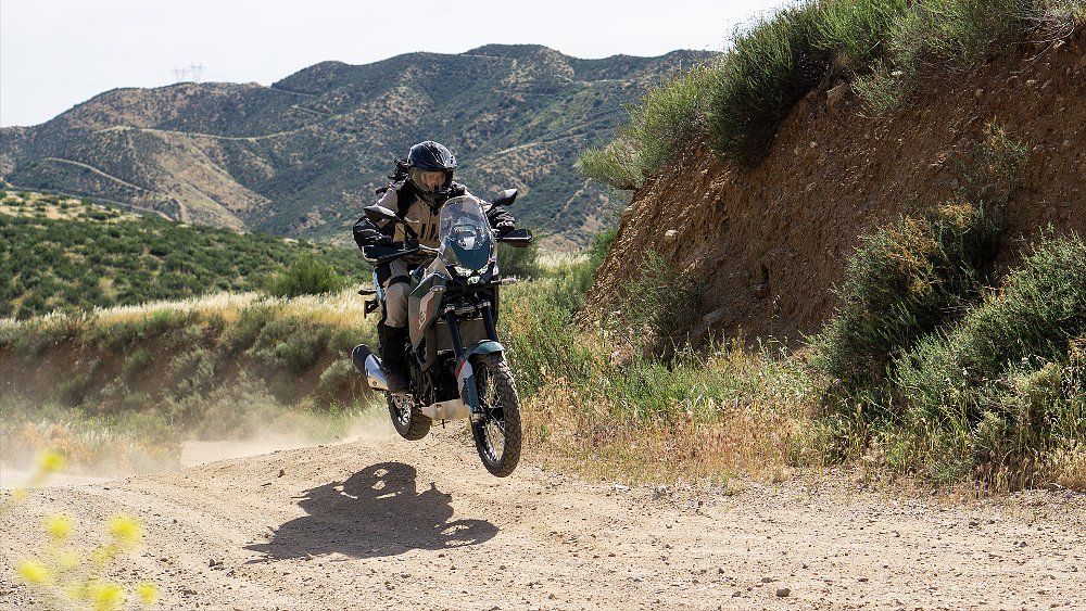 Dustin launches the KLE500 SE over an off-road jump.