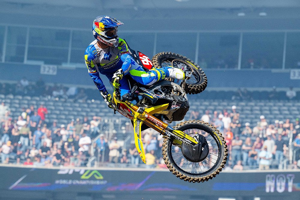 Roczen whips his Suzuki sideways as he flies over a jump during the Denver Supercross race