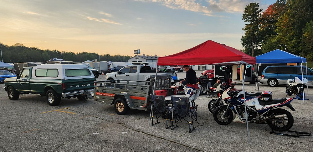 photo of the rider's setup in the paddock, with a rented trailer and canopy