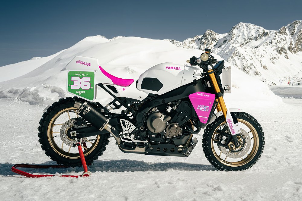 white and pink Yamaha XSR900 race bike parked on snow