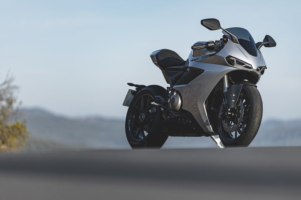 Silver Manx R sport bike parked on a horizon