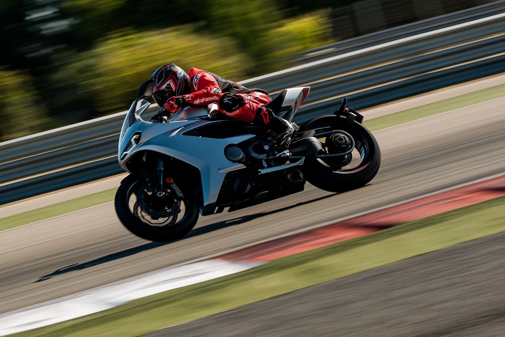 riding the silver Norton Manx R Signature on the track