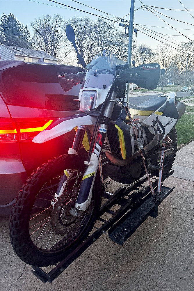 Ricky's Husqvarna 701 Enduro mounted to the hitch carrier on his Toyota Highlander.