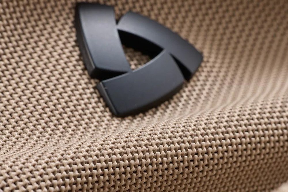 A close-up of the mesh material on a REV'IT! jacket.