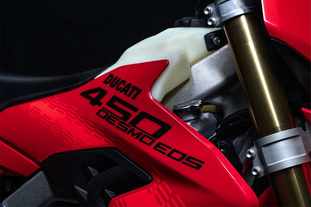 A close-up of the graphic branding on the Desmo450 EDS's side panel.