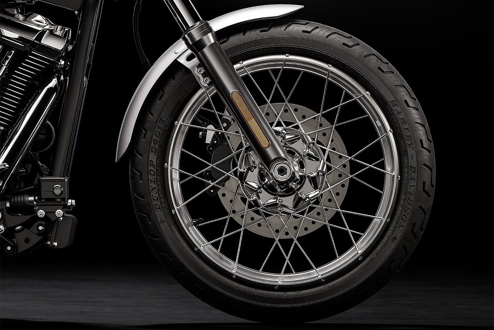 A close-up of the Super Glide's tubeless spoked front wheel.