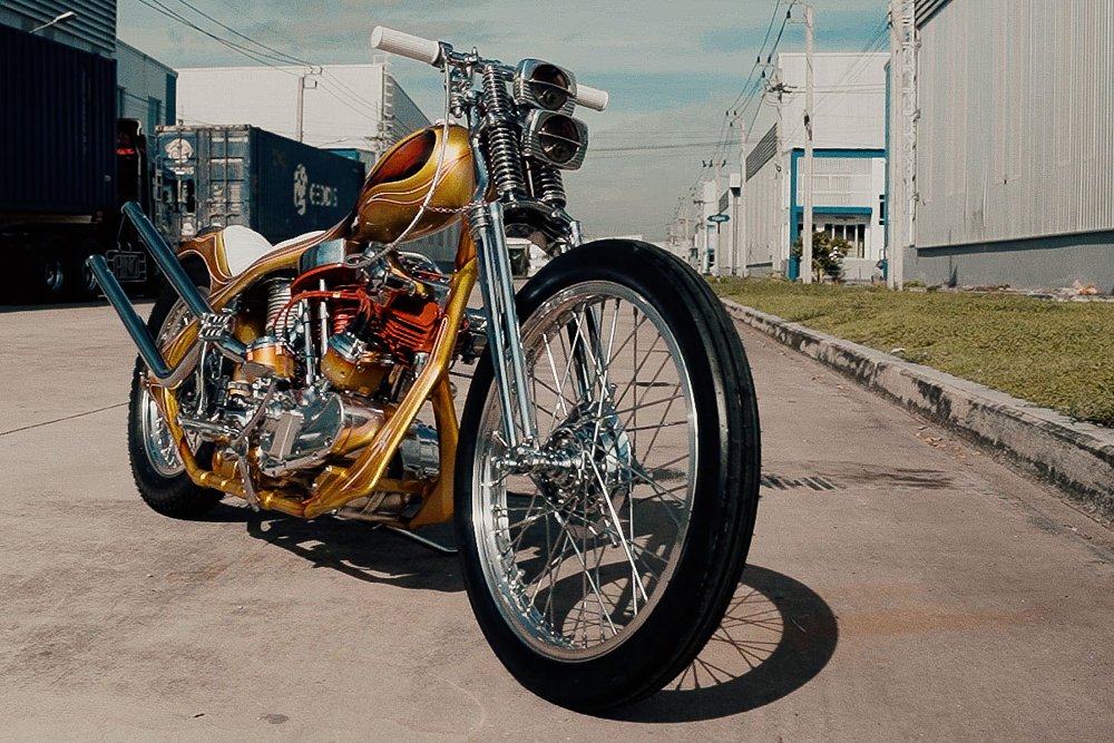 orange chopper parked in an industrial area