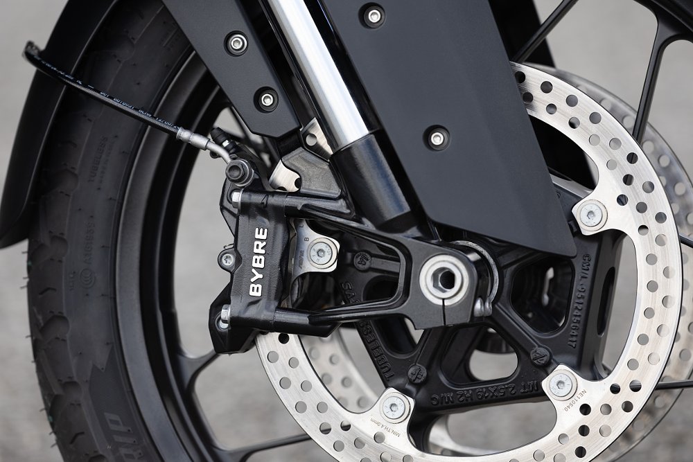 close view of the front brake rotors and caliper