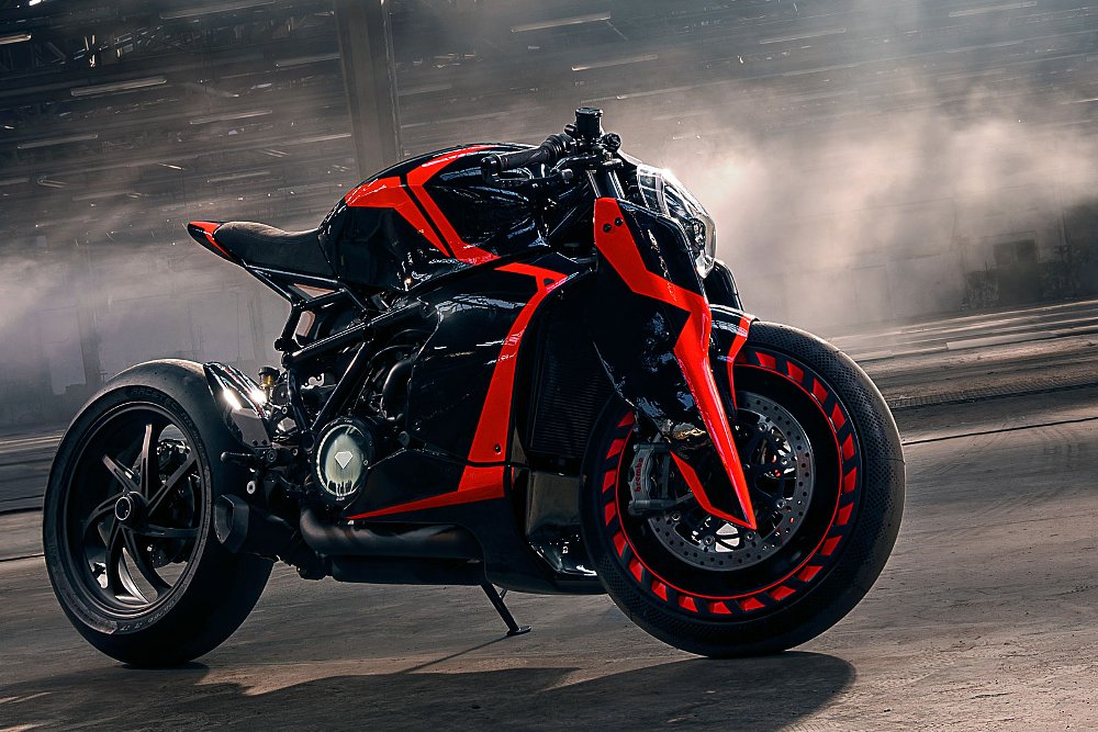 black, low-slung high-performance motorcycle with glowing red-orange sections of the bodywork