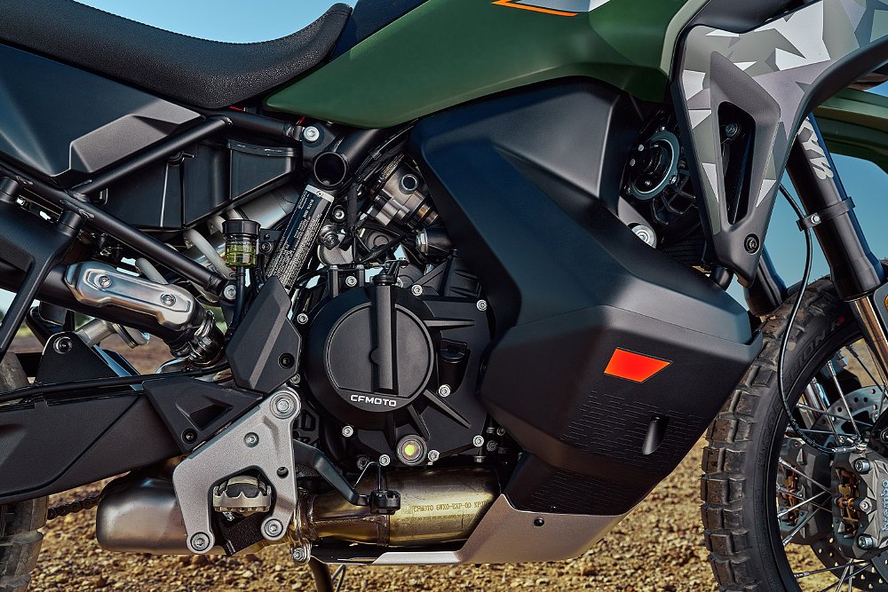 A close up of the Ibex 950's parallel-twin engine and low-mounted gas tank.
