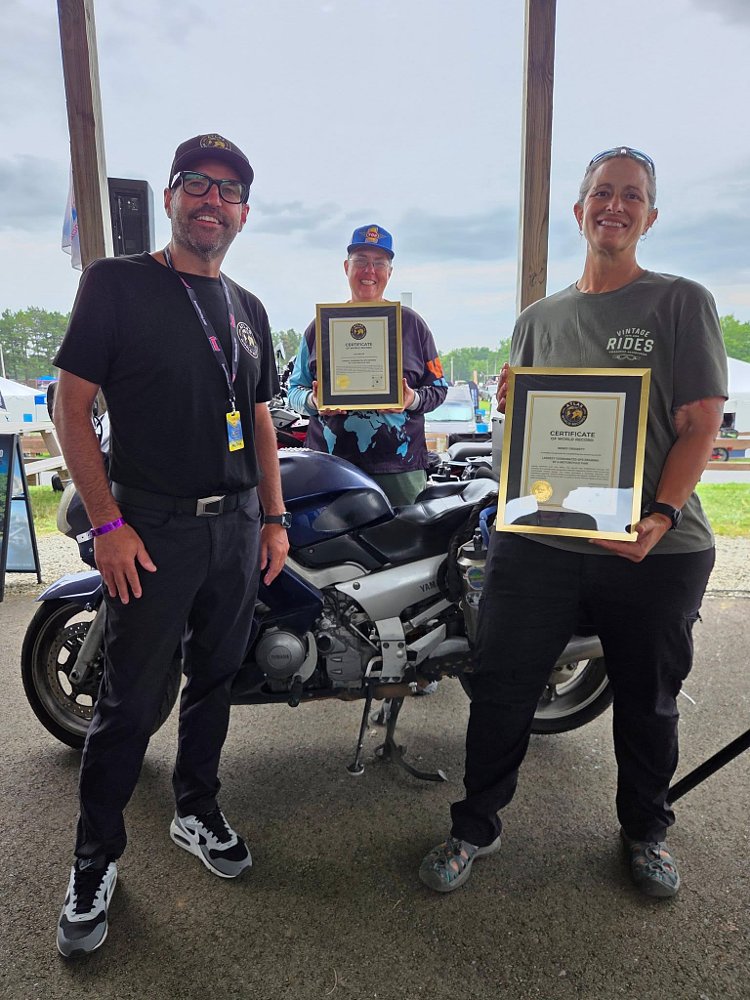 Liza and Wendy pose with their world record certificates in hand.