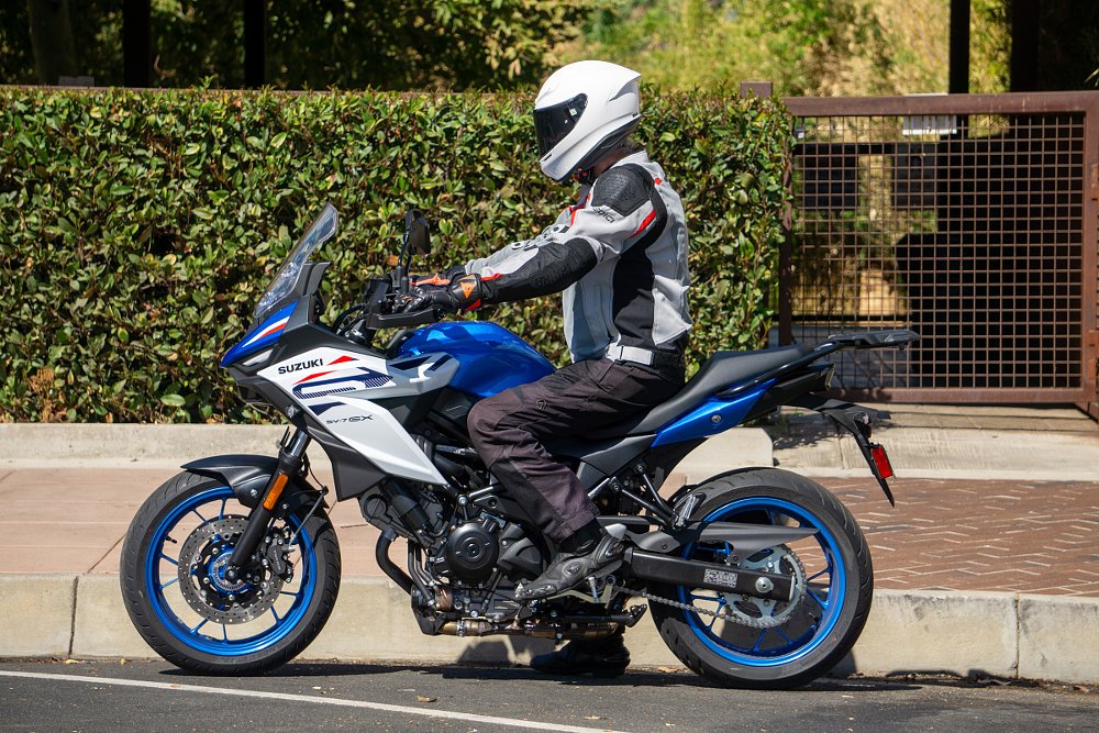 side view showing the rider in the riding position, sitting upright