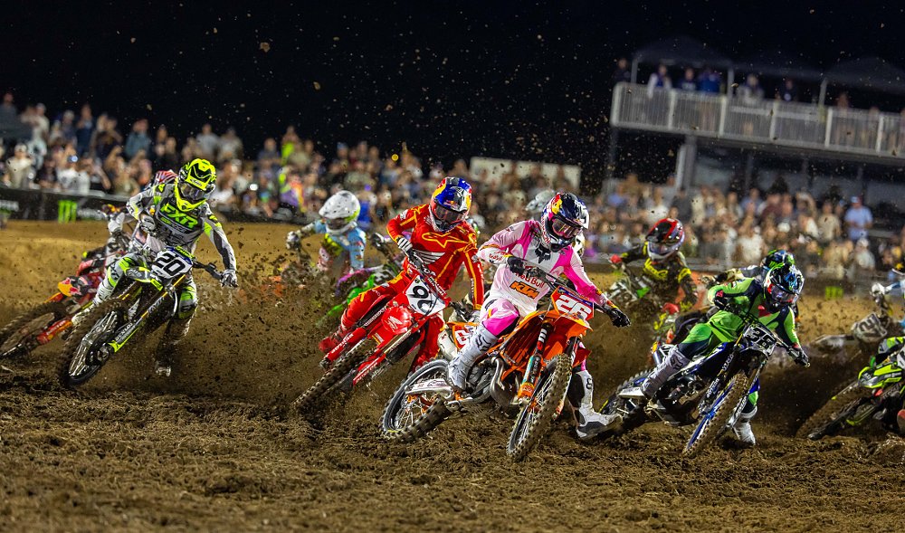 Prado on his KTM leads the packed field of riders into the first turn in the second moto