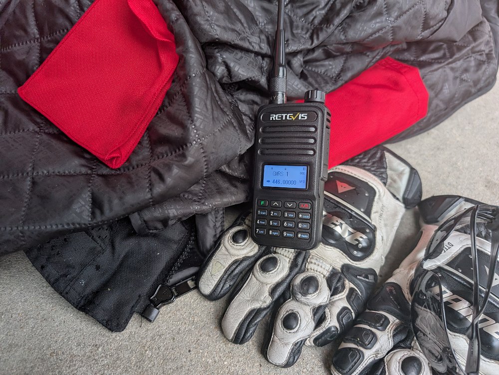 picture of portable radio with motorcycle gloves
