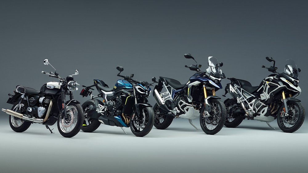The Bonneville T40, Street Triple 798, Tiger 900, and Tiger 1200 lined up in photo studio.