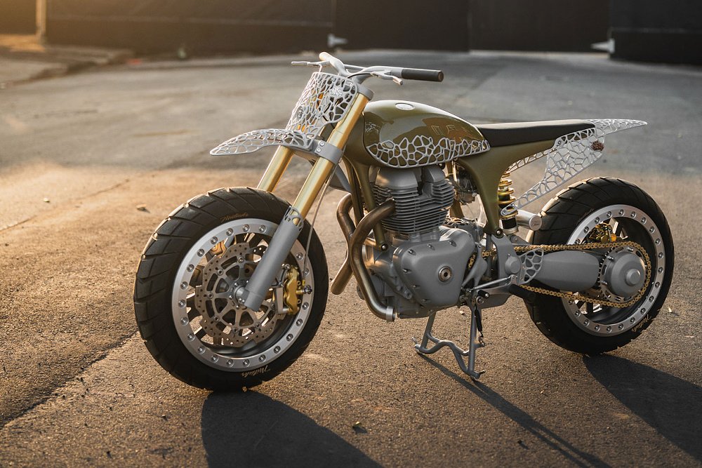 side view of the gold custom with white metalwork