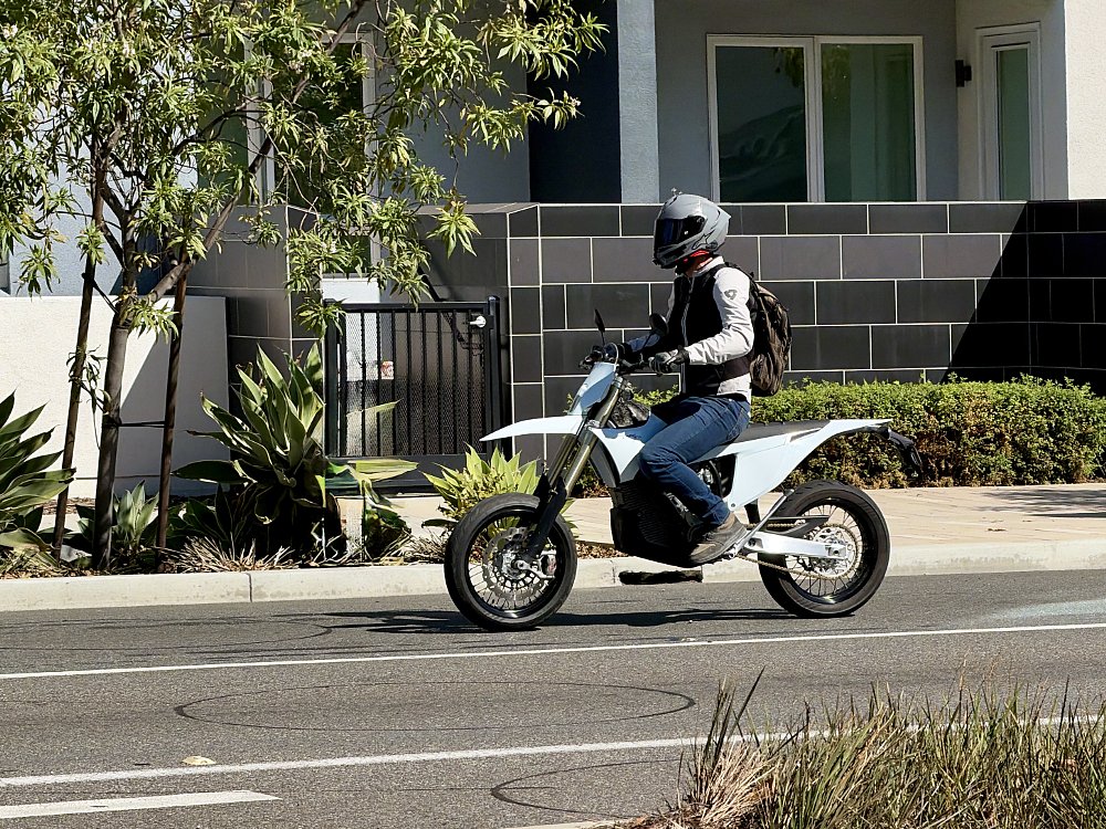 2026 Stark VARG SM riding along a city street.