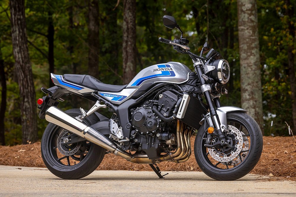 The CB1000F staged before a tree-lined background.