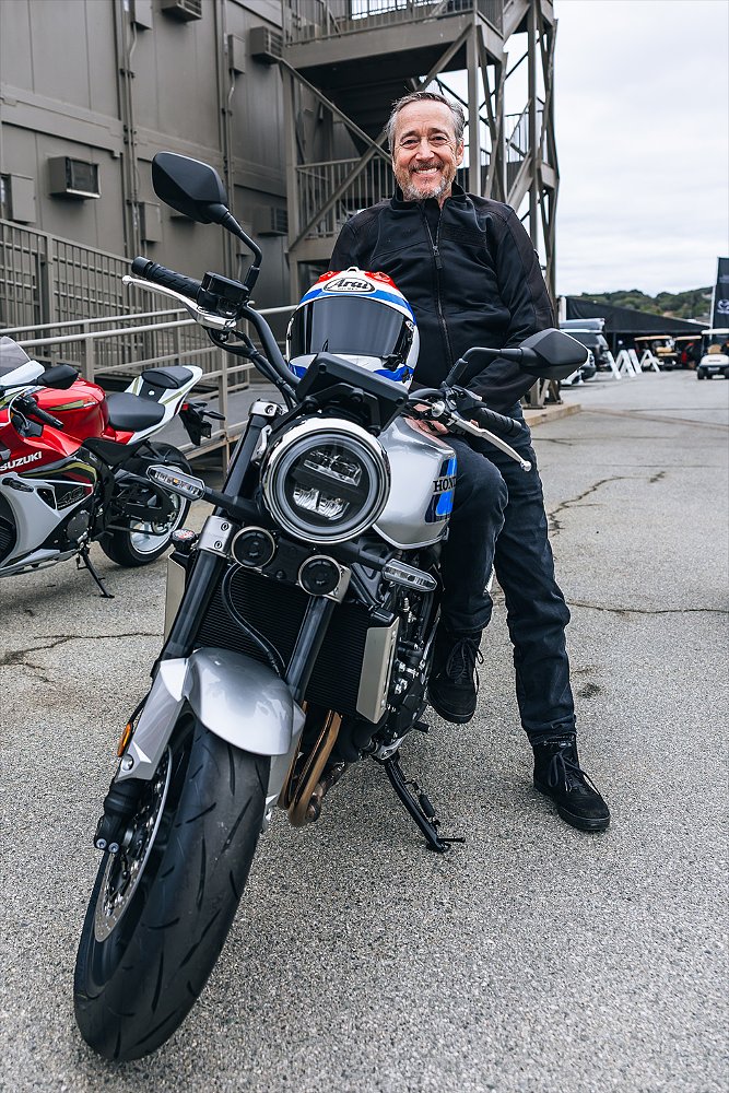 Freddie Spencer poses with the Honda CB1000F at the 2026 Monterey Car Week.