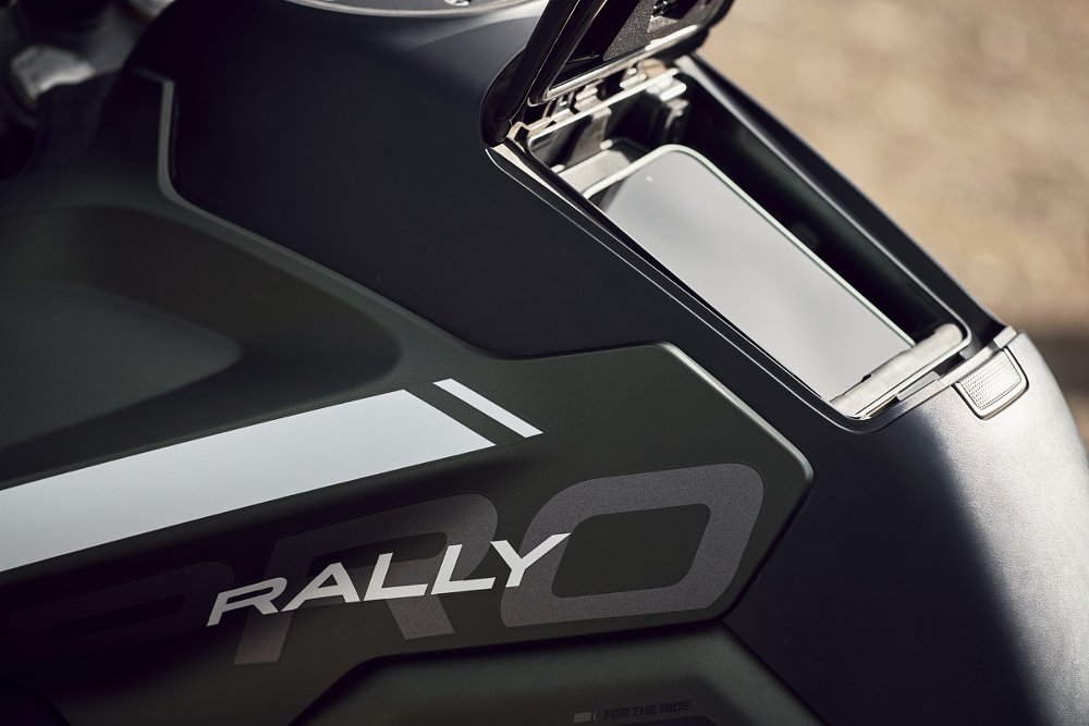 close view of powered, ventilated phone carrying space on the Triumph Tiger