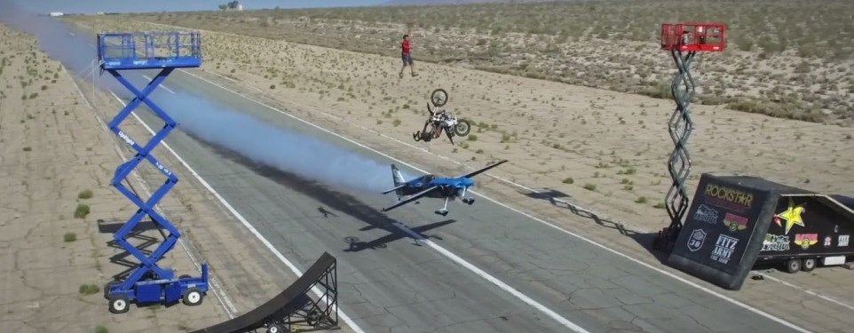 Video: A backflip, a stunt plane and a guy walking a high line