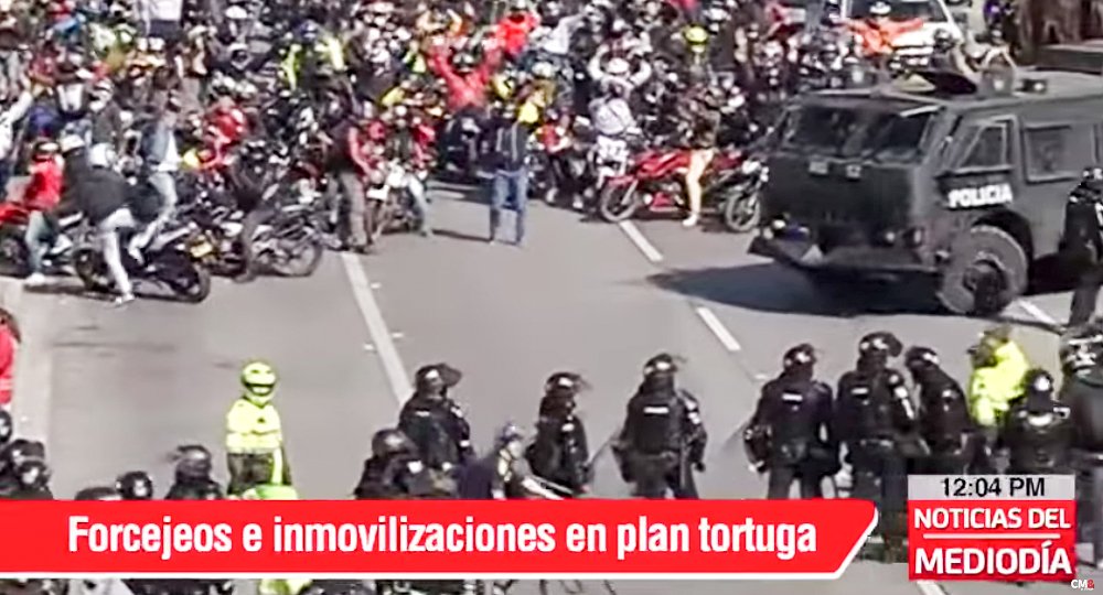 Motorcyclists in Colombia protest ban on male passengers