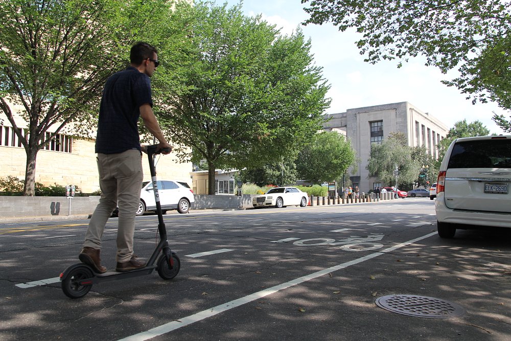 Riding electric scooter