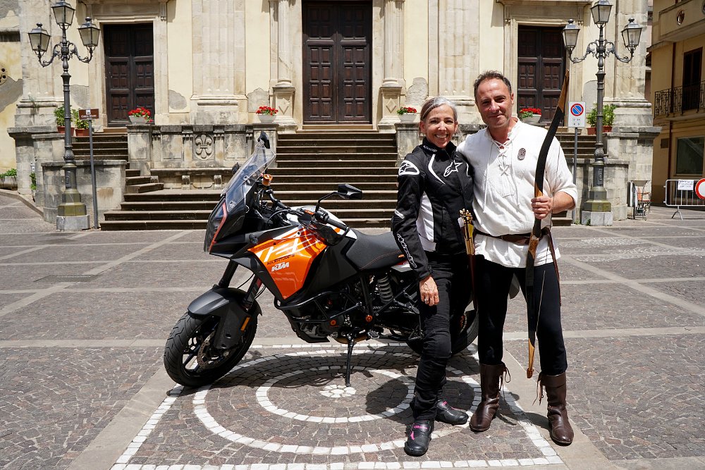 Mary with archer in town square