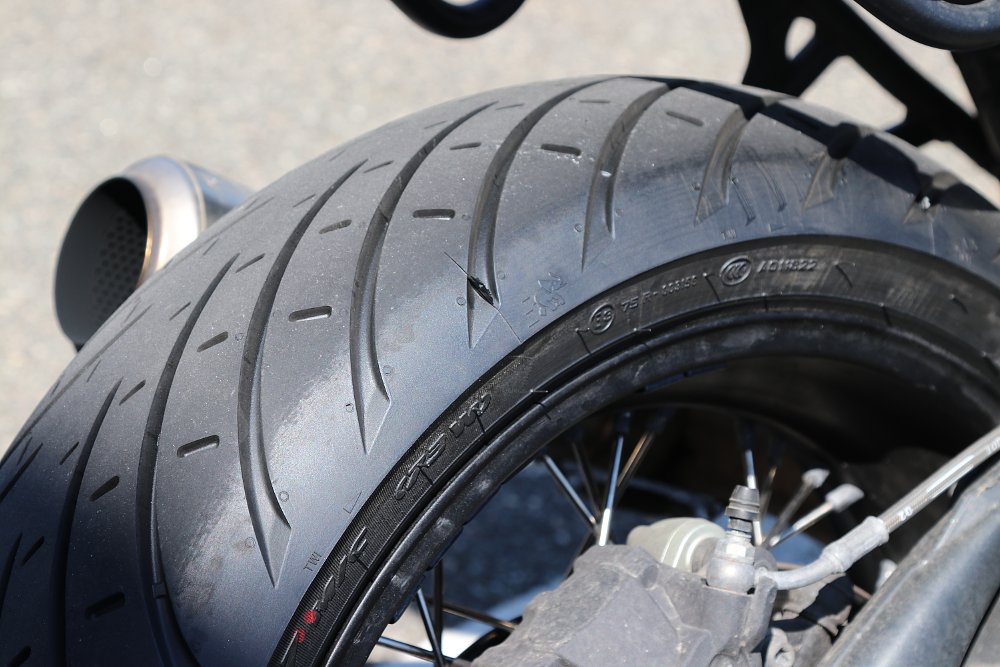What are chicken strips on motorcycle tires?